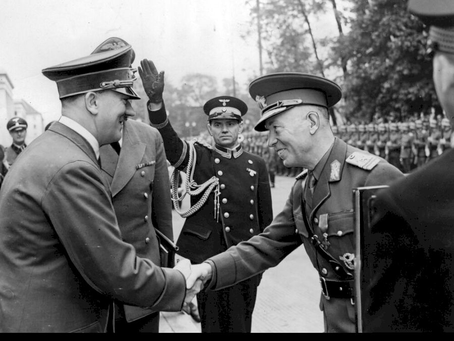 Adolf Hitler greets Ion Antonescu at his arrival in Munich