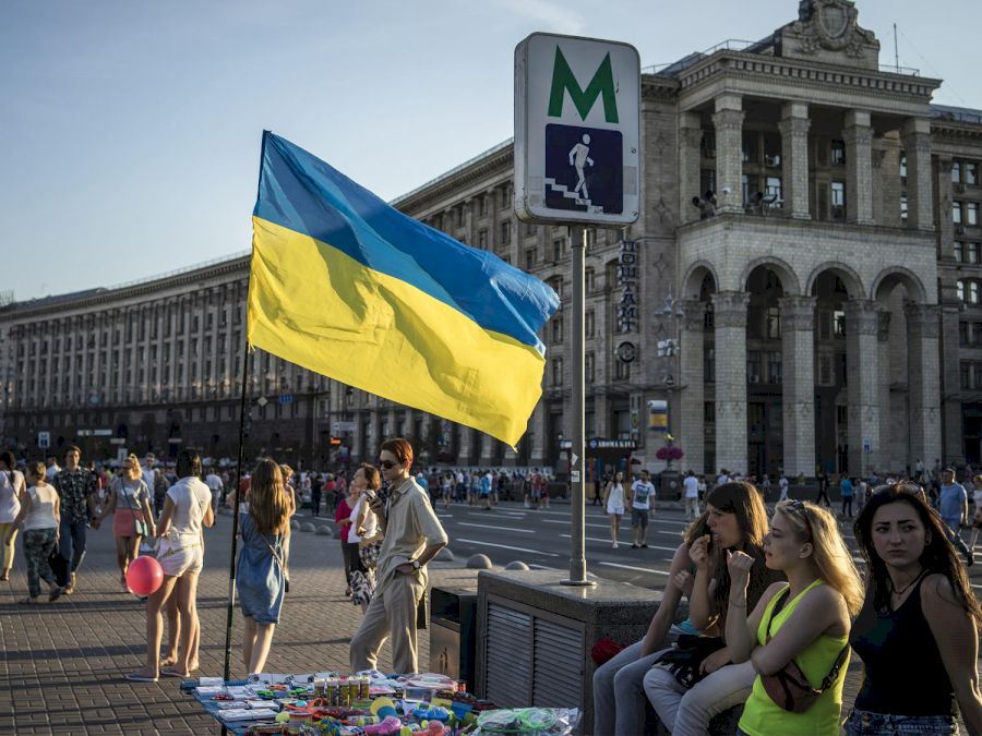 A Ukranian flag flies in downtown Kiev.