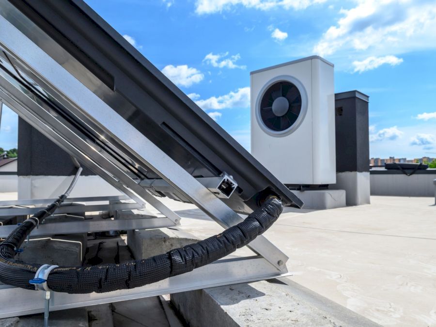 Heat pump and solar collector on the roof